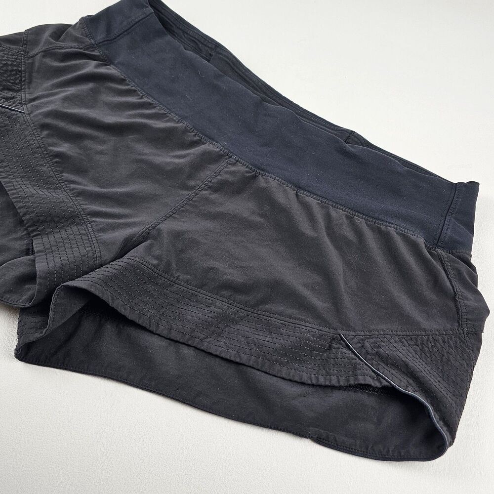 Lululemon Womens Size 10 Black Running Shorts Split Hem Zip Pocket Reflective